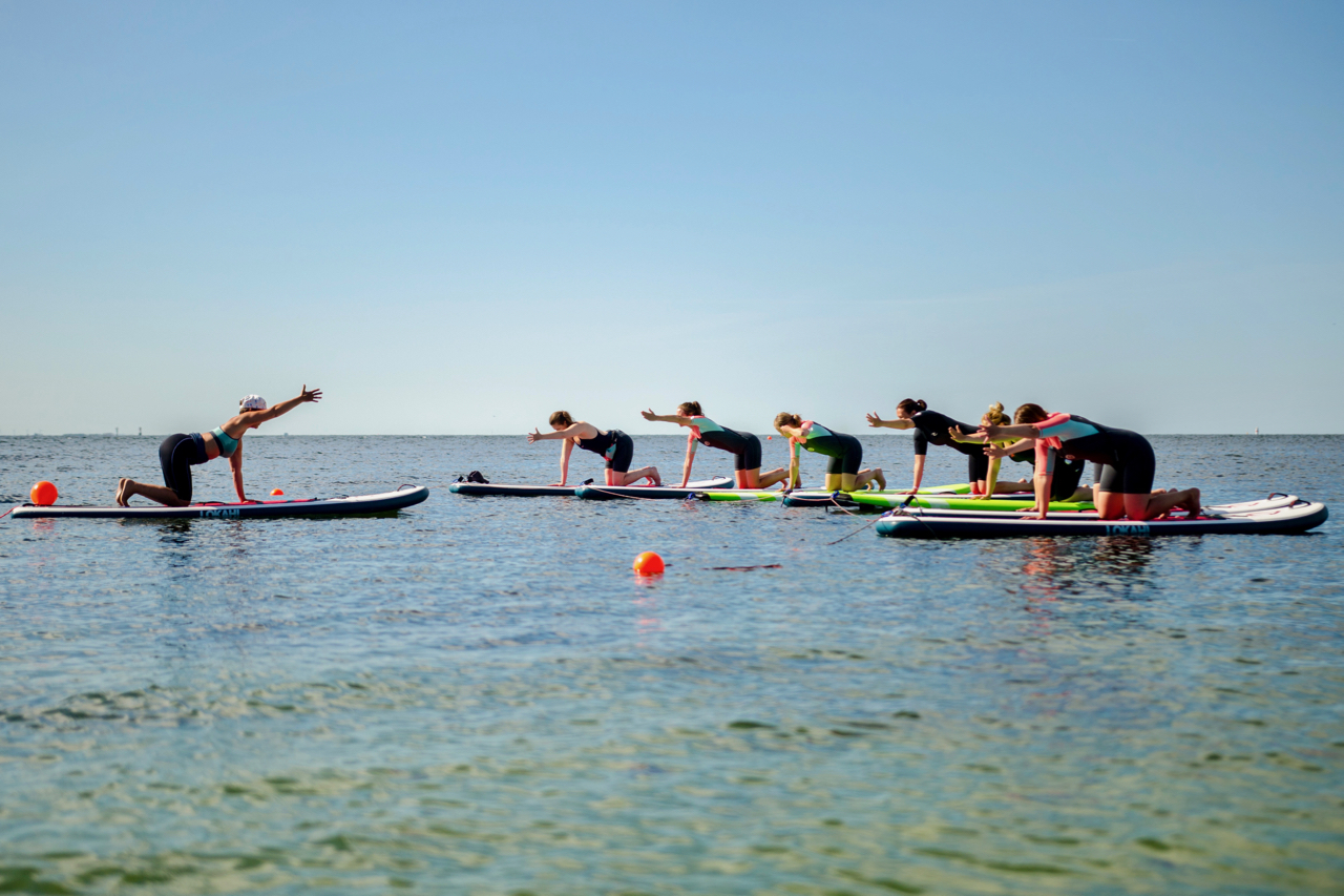 SUP-yoga i grupp