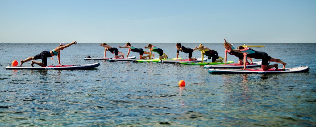 SUP-yoga i Malmö med Nellie Rolf